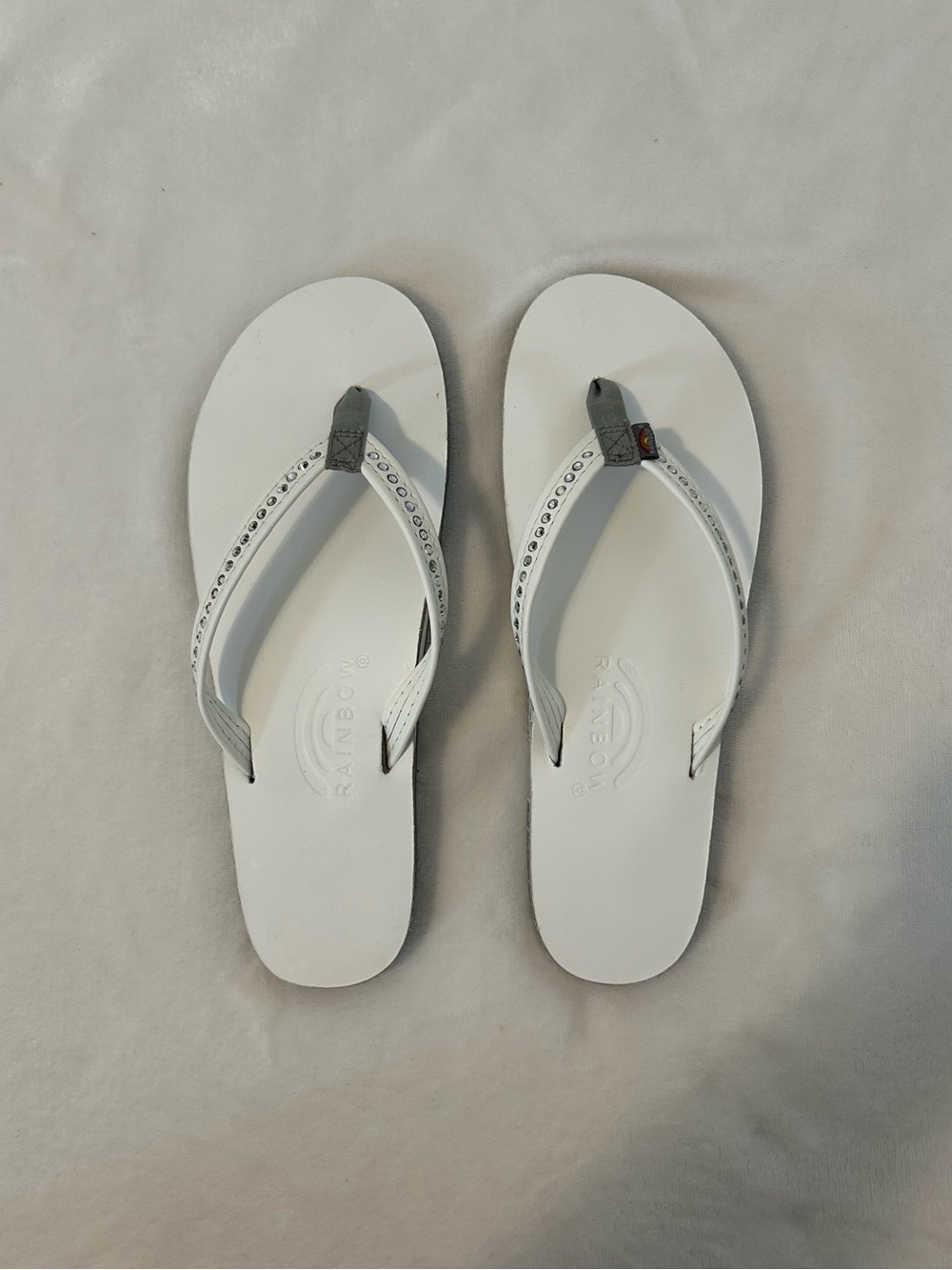 Rainbow White Flip Flop Sandals with Embellished Straps. Brand new.